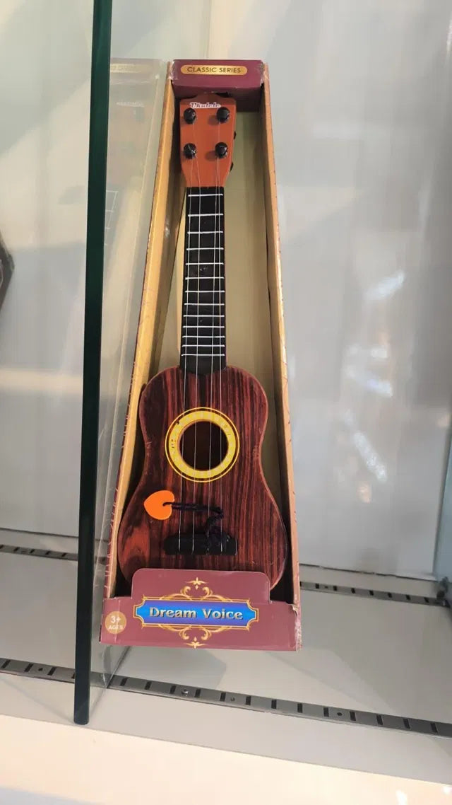 Mini Wooden Finish Plastic Guitar Music Instrument with 4 strings Clear sound
