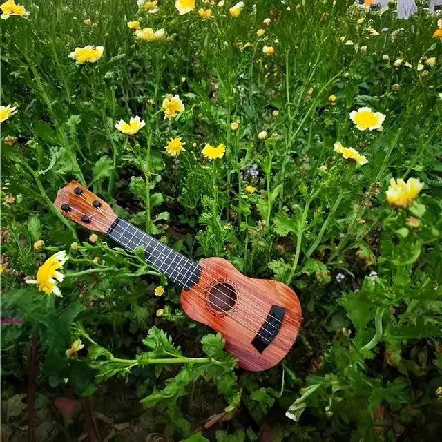 Mini Wooden Finish Plastic Guitar Music Instrument with 4 strings Clear sound